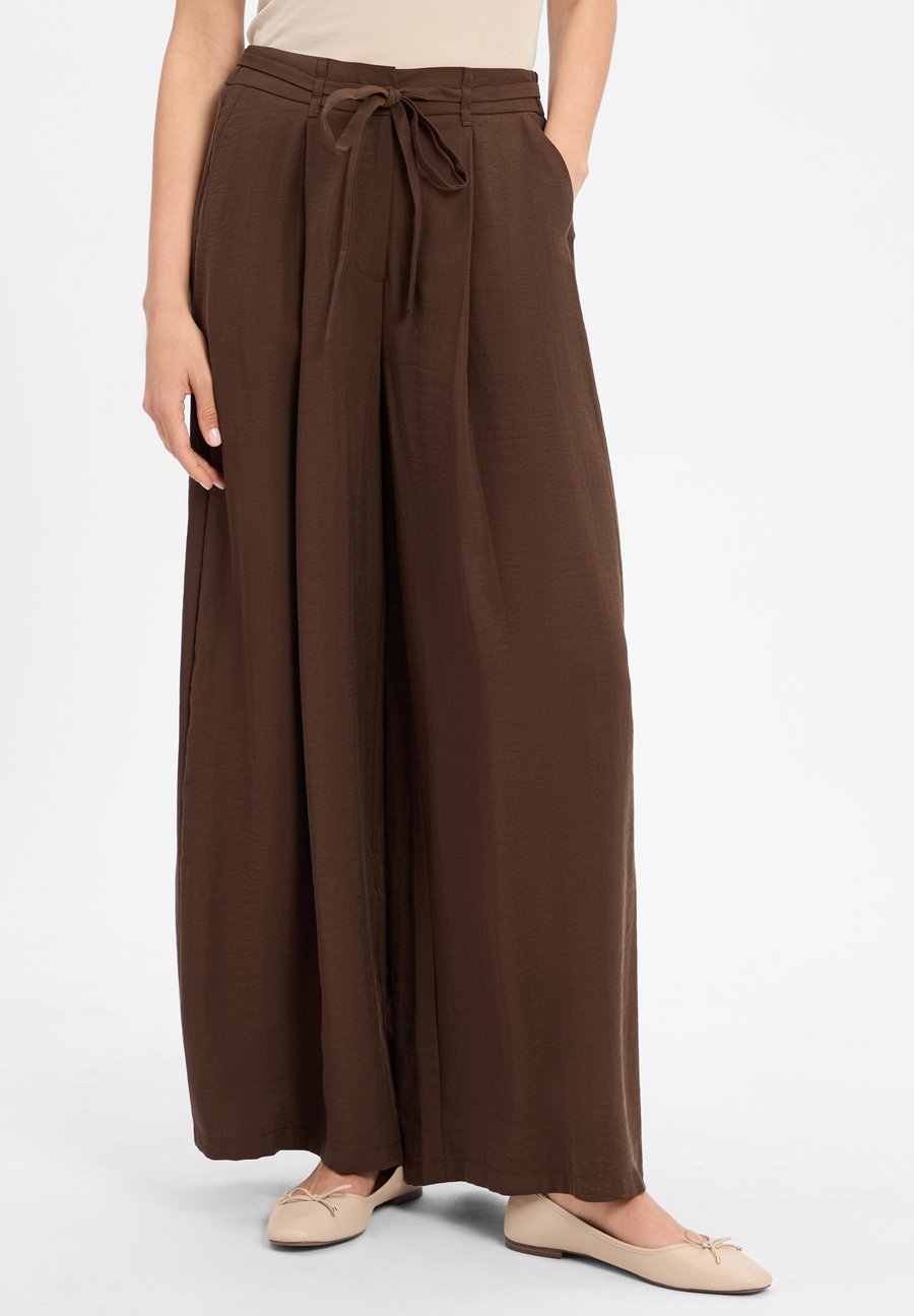Брюки More & More Trousers, Schoko/Brown
Брюки More & More Trousers, Schoko/Brown