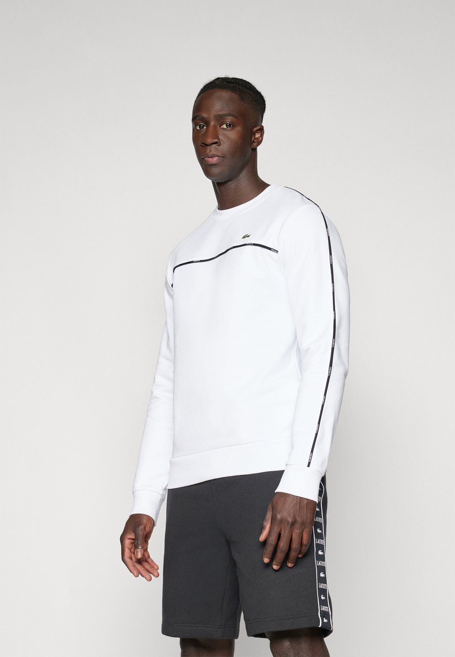 Толстовка Lacoste Sport TAPE, White
Толстовка Lacoste Sport TAPE, White