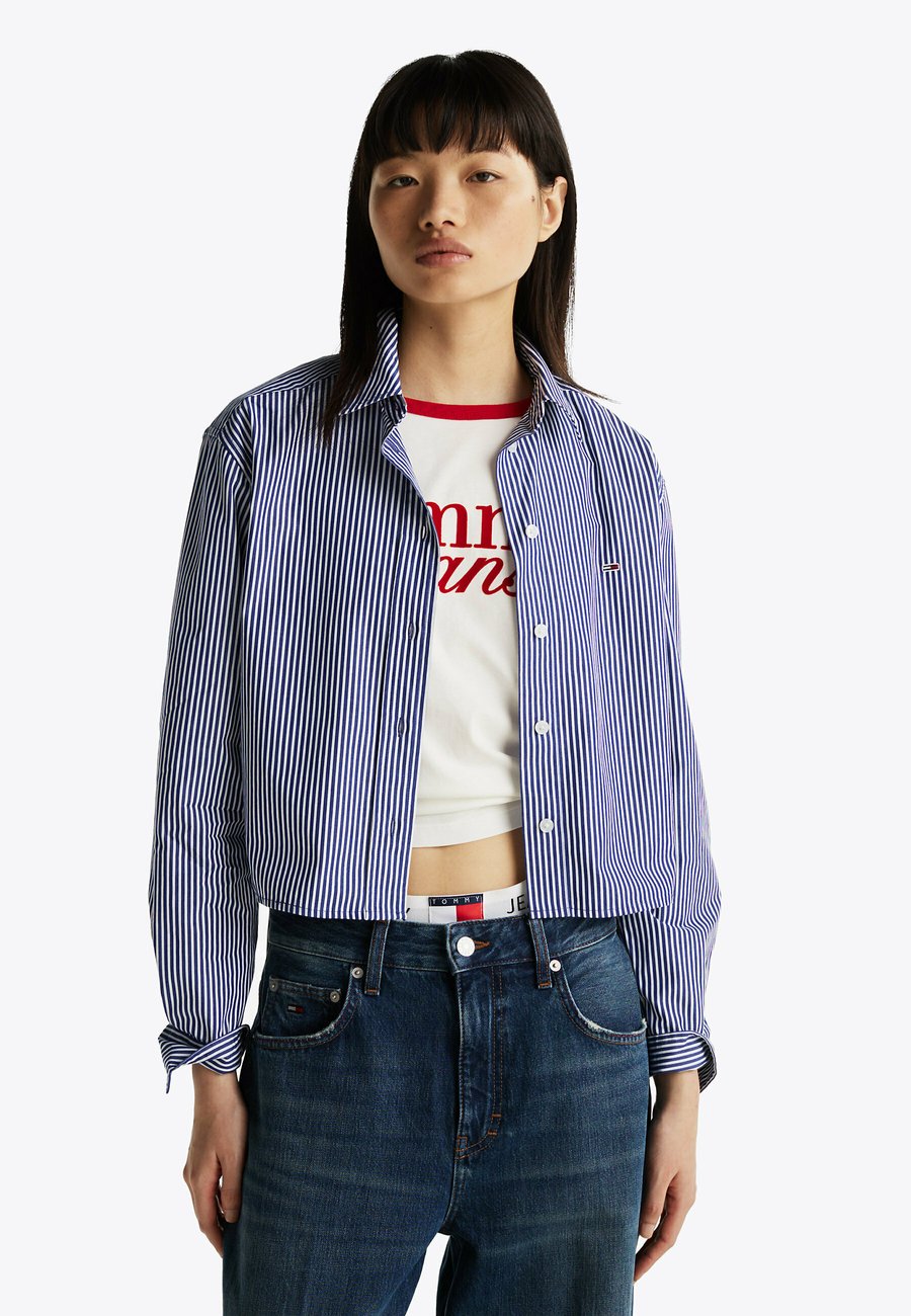 Блуза Tommy Jeans Button-down blouse, Navy White Stripe/Multi-Coloured
Блуза Tommy Jeans Button-down blouse, Navy White Stripe/Multi-Coloured