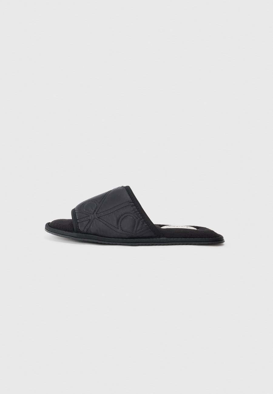 Тапочки Calvin Klein HOTEL, Triple Black/Black
Тапочки Calvin Klein HOTEL, Triple Black/Black