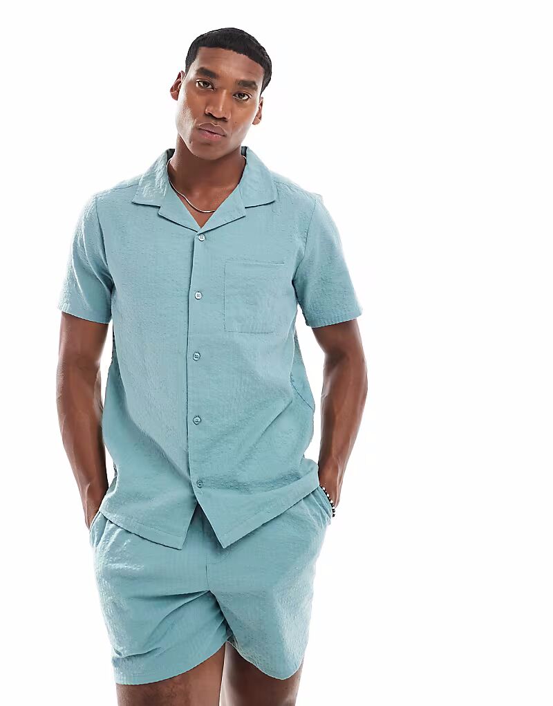 Рубашка New Look из сирсакера в цвете «бирюза»
Рубашка New Look из сирсакера в цвете «бирюза»