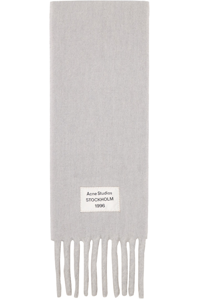 Acne Studios Серый двухцветный шарф из альпаки
Acne Studios Серый двухцветный шарф из альпаки
