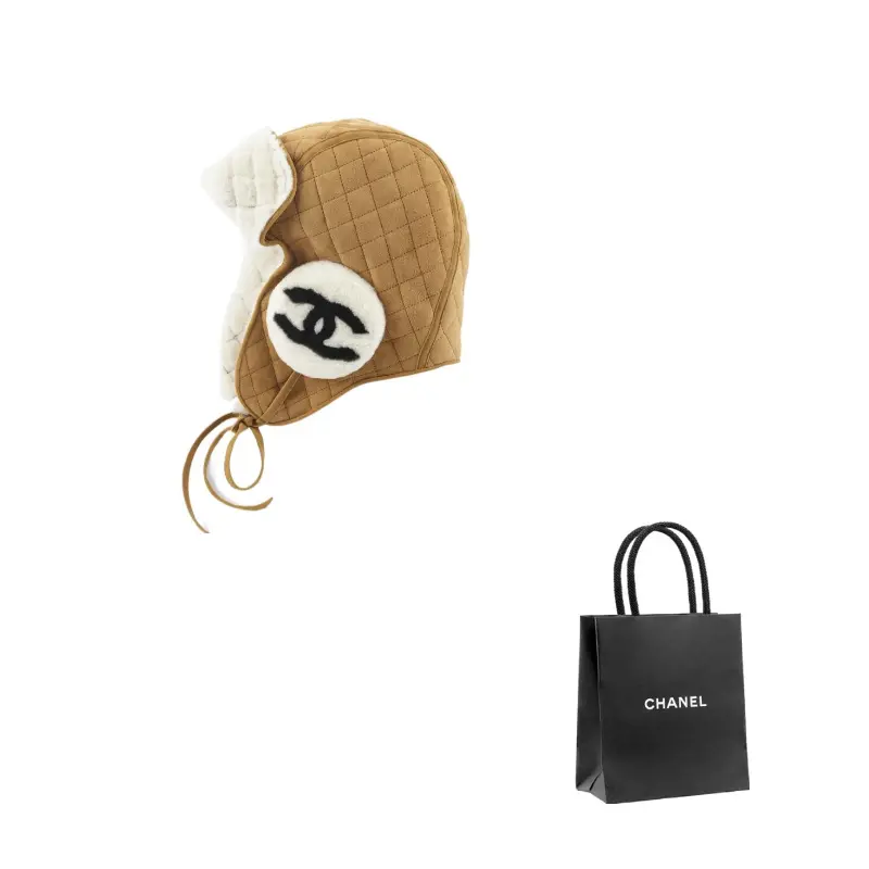 CHANEL Женская шапка-ушанка из овчины Brown
CHANEL Женская шапка-ушанка из овчины Brown