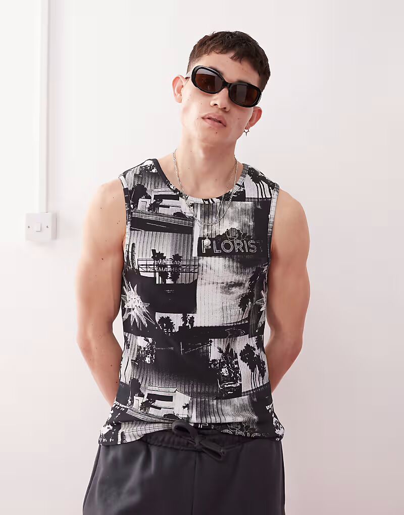 Майка-топ COLLUSION с принтом по всей поверхности в многоцветном исполнении
Майка-топ COLLUSION с принтом по всей поверхности в многоцветном исполнении