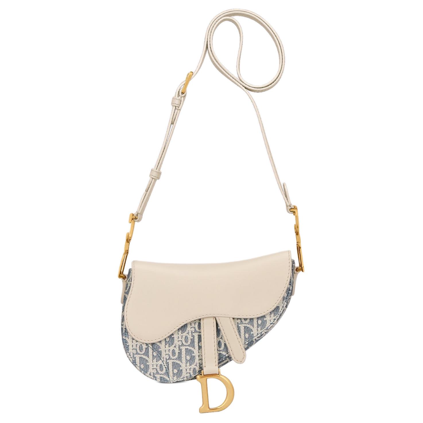 DIOR Сумка-седло джинсовая косая миниатюрная женская синяя и бежевая
DIOR Сумка-седло джинсовая косая миниатюрная женская синяя и бежевая