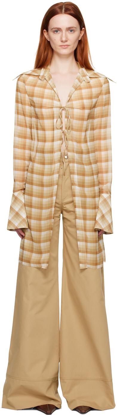 Светло-коричневая рубашка в клетку JUNEYEN
Светло-коричневая рубашка в клетку JUNEYEN