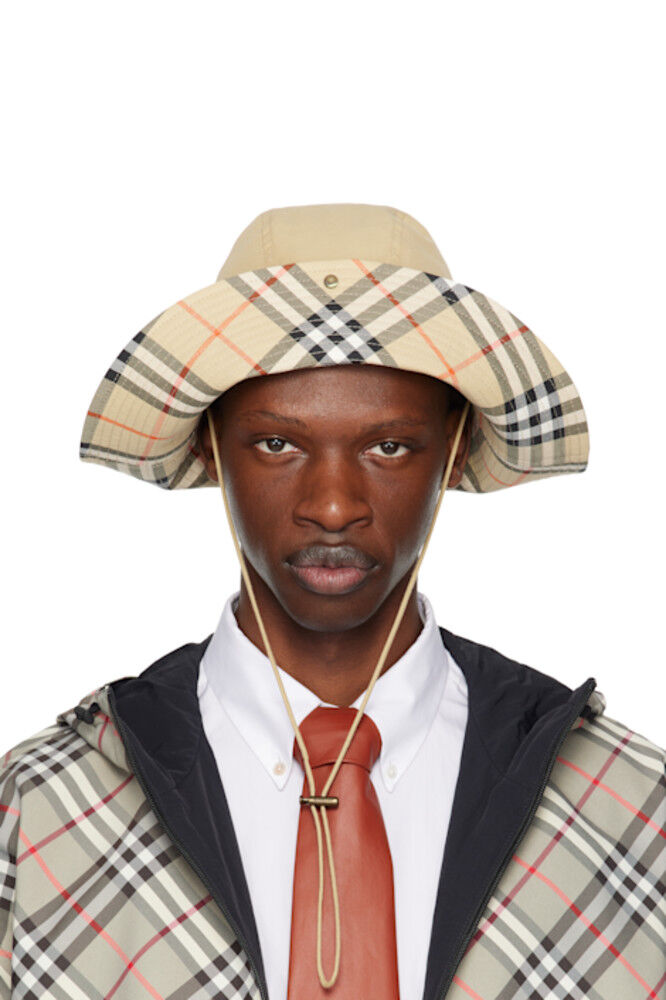 Бежевая шляпа-панама из габардина в клетку Burberry
Бежевая шляпа-панама из габардина в клетку Burberry