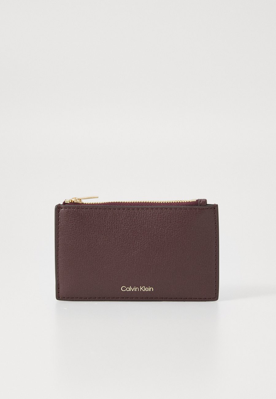 Кошелек Calvin Klein EMBOSSED LOGO, Fudge/Espresso/Brown
Кошелек Calvin Klein EMBOSSED LOGO, Fudge/Espresso/Brown