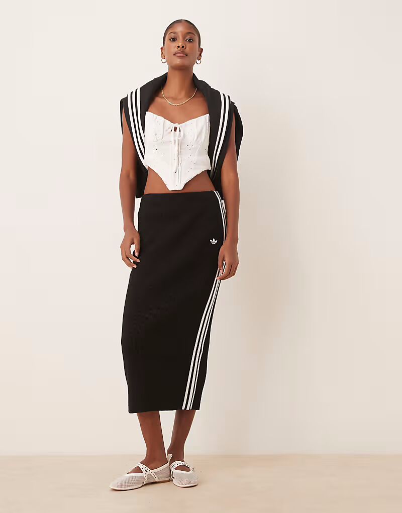 Юбка Adidas Originals Adicolor с тремя полосками черного цвета
Юбка Adidas Originals Adicolor с тремя полосками черного цвета