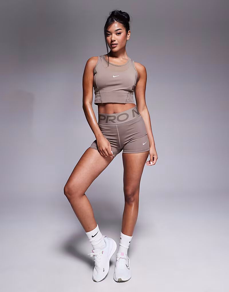 Коричневые шорты-леггинсы Pro Training Dri-FIT Sculpt с высокой посадкой и шириной 3 дюйма Nike Training
Коричневые шорты-леггинсы Pro Training Dri-FIT Sculpt с высокой посадкой и шириной 3 дюйма Nike Training