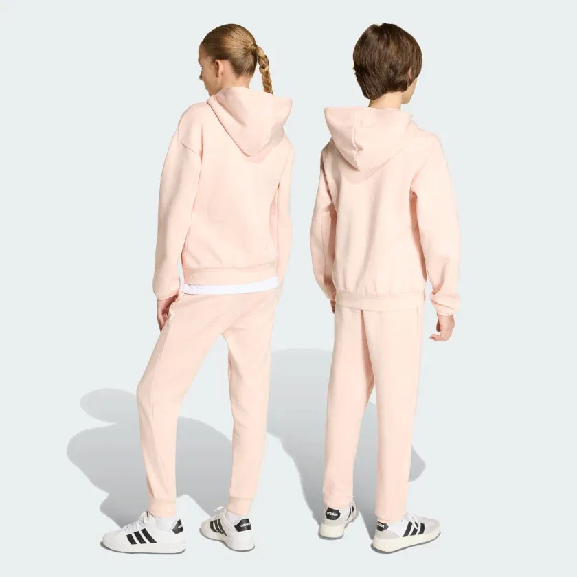 Детские спортивные брюки зауженные adidas Z.N.E., Blush Pink / Pink Tint — фото 2
