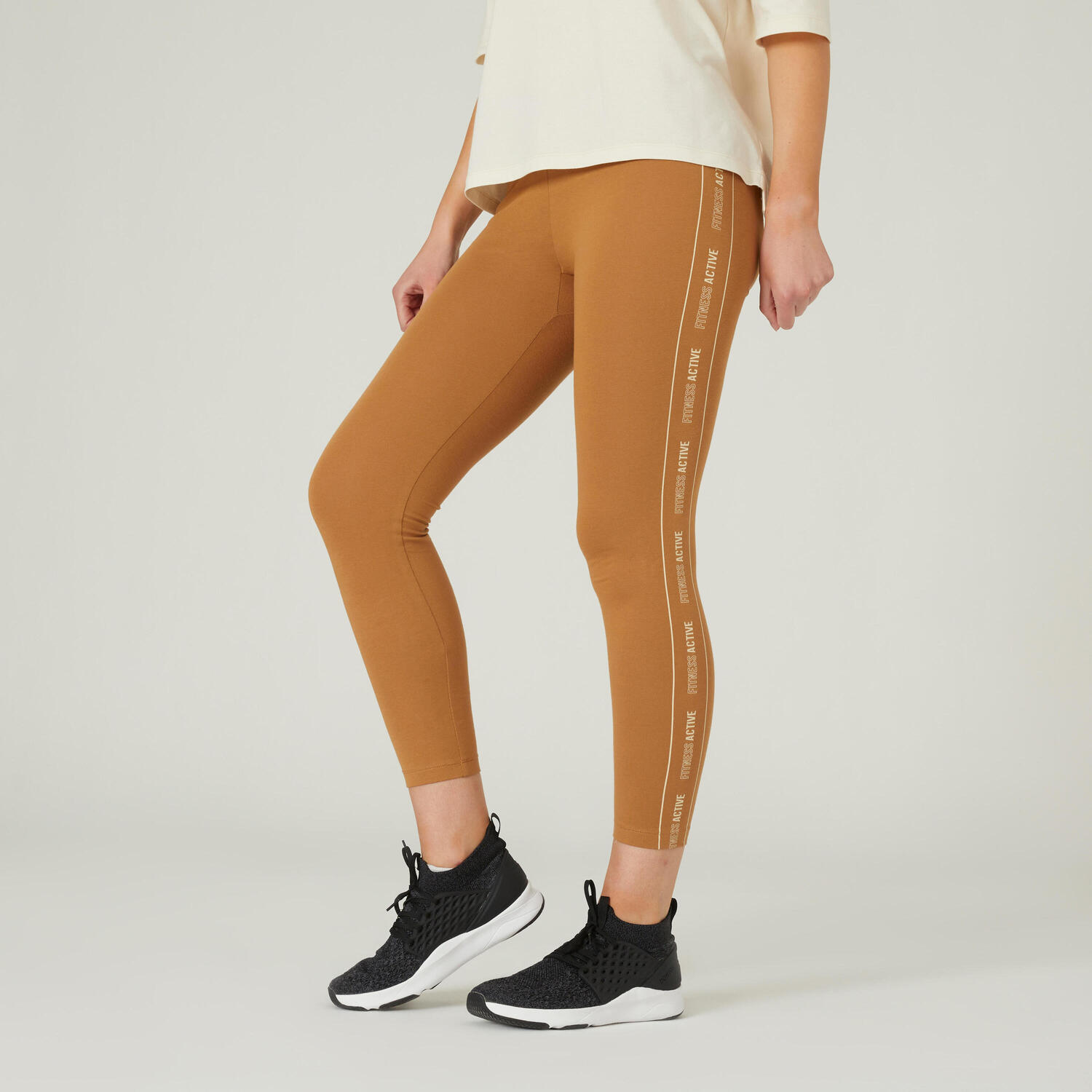 

Леггинсы 7/8 Fit+ коричневые с рисунком DOMYOS, орешник