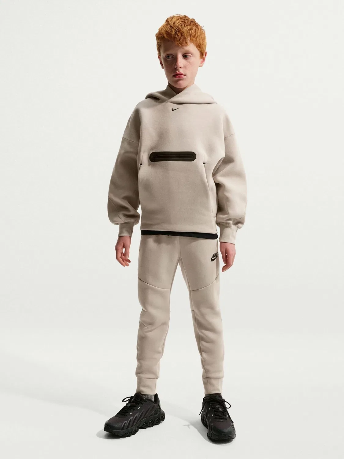 Джоггеры с зауженной штаниной Nike Tech Fleece, коричневый