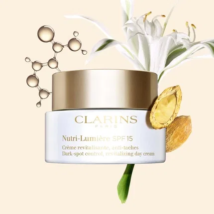 Крем для лица дневной восстанавливающий против пигментных пятен SPF 15 Clarins Nutri-Lumiere