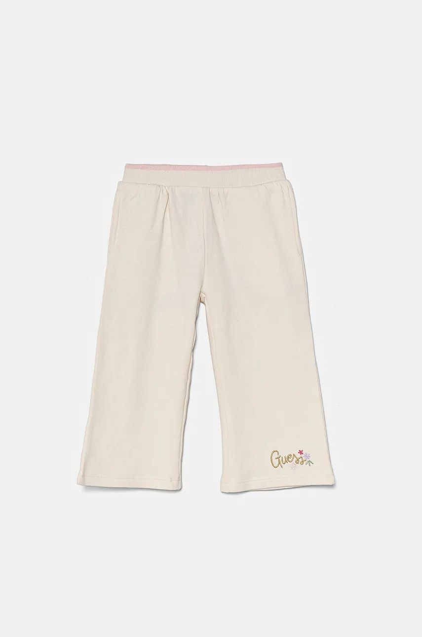 

Хлопковые спортивные штаны Guess, бежевый