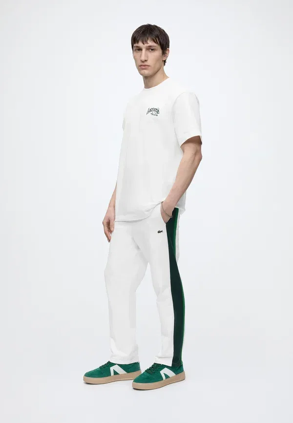 Спортивные брюки Lacoste, однотонные, хлопок — фото 2