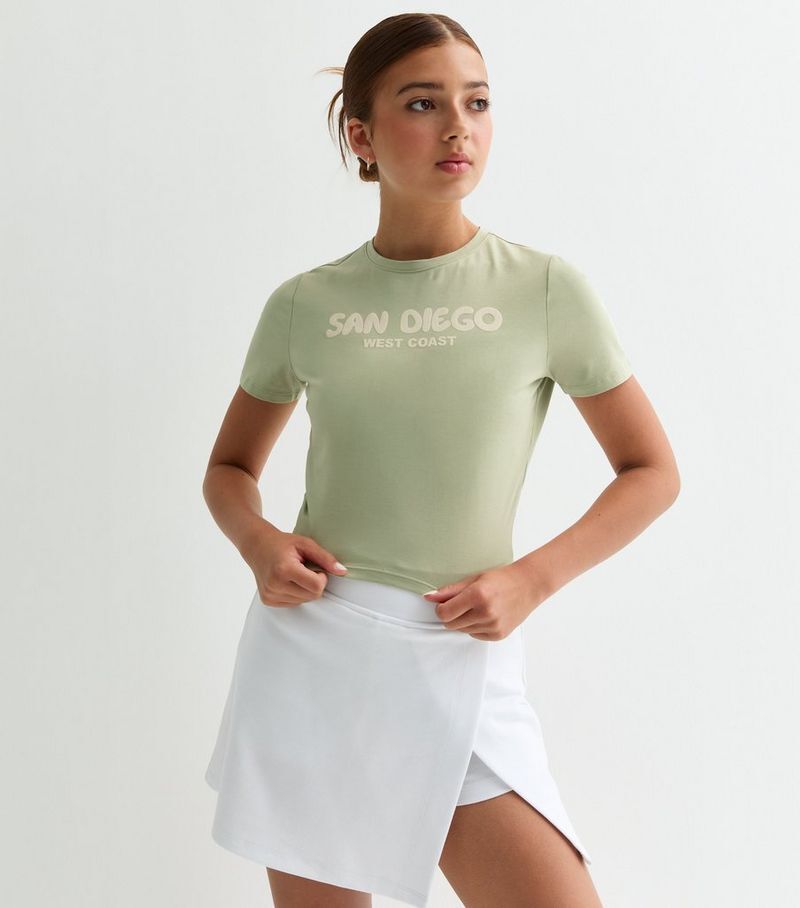 

Светло-зеленая хлопковая мини-футболка с надписью San Diego Bubble для девочек New Look, светло-зеленый