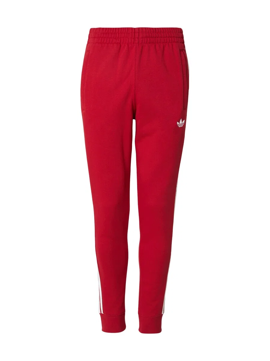 Зауженные брюки ADIDAS ORIGINALS красного цвета