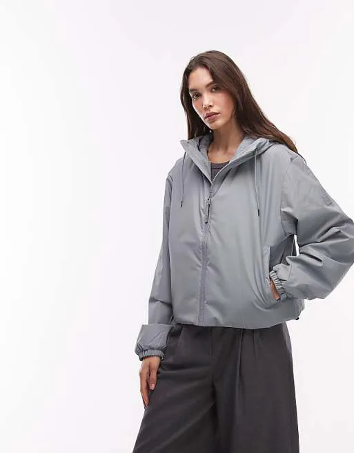 

Голубая водонепроницаемая утепленная куртка с капюшоном Rains 15780 Lohja