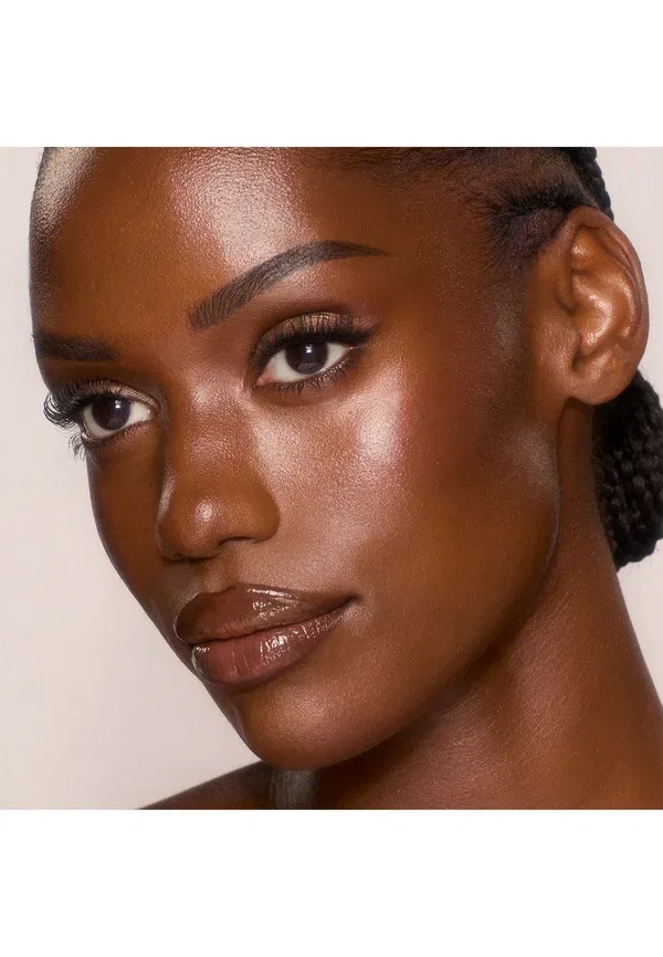 Невероятно сияющая тональная основа для лица Unreal Skin Sheer Glow Tint 9 г Charlotte Tilbury, цвет 14_deep — фото 2