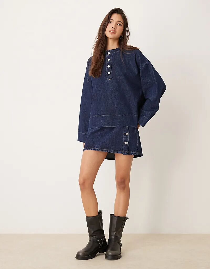 

Мини-юбка из денима с пуговицами цвета индиго ASOS DESIGN