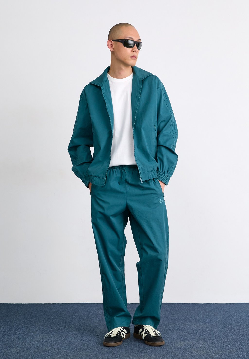 Брюки FIREBIRD PANTS Adidas Originals, темно-зеленый — фото 2