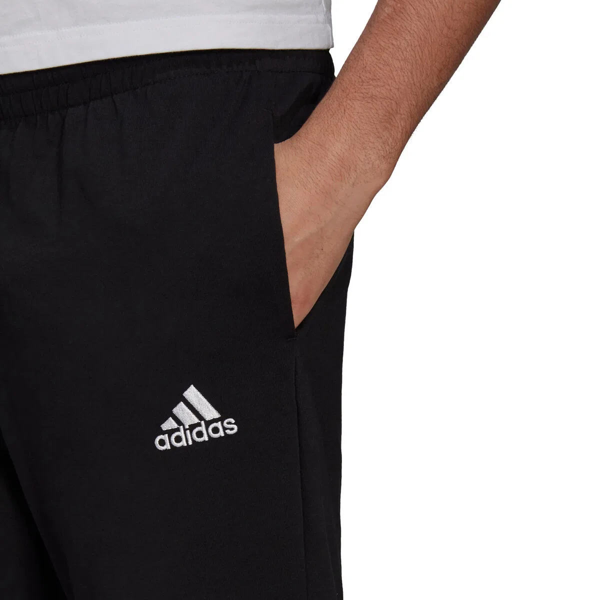 Мужские спортивные штаны с зауженными штанинами adidas Essentials Tapered, Schwarz — фото 3