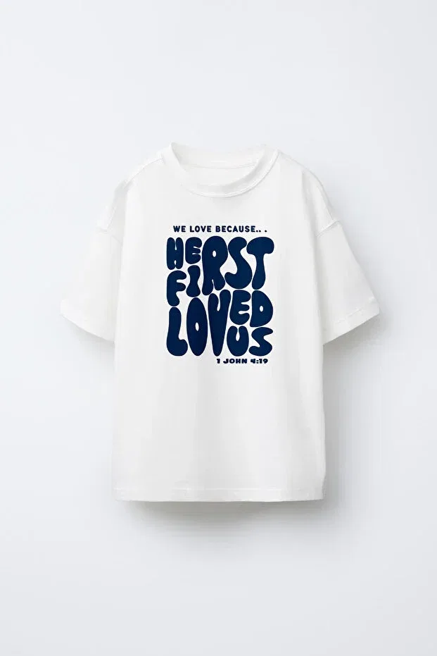 Детская футболка оверсайз с принтом He First Loved Us Printed Kids Oversized T-Shirt C.C.L. Coccolin Kids Baby Clup, White
