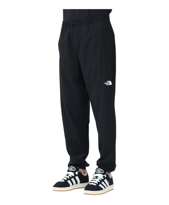 

Ветрозащитные черные брюки Mountain Athletic The North Face, черный