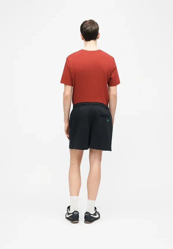 Спортивные штаны Nike Sportswear Club Flow, черный/малахитовый — фото 4
