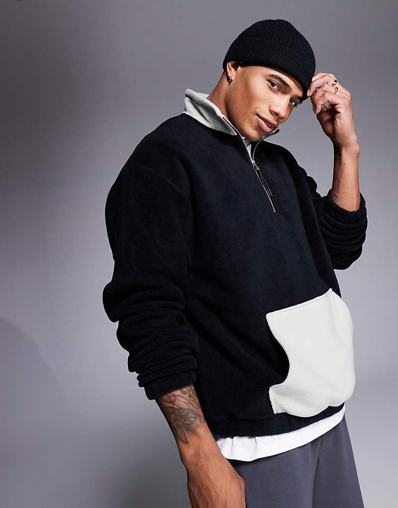 

Черная флисовая толстовка оверсайз с полумолнией и карманом ASOS DESIGN