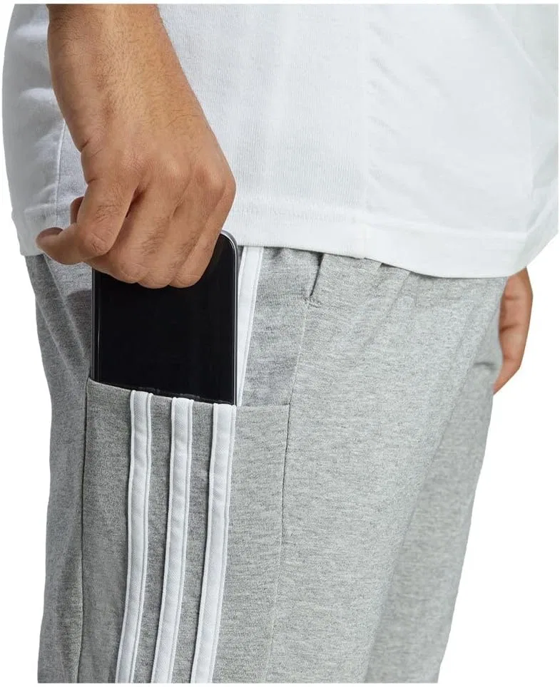 adidas - Спортивные брюки Essentials Single Jersey Tapered Open Hem 3-Stripes для мужчин — фото 3