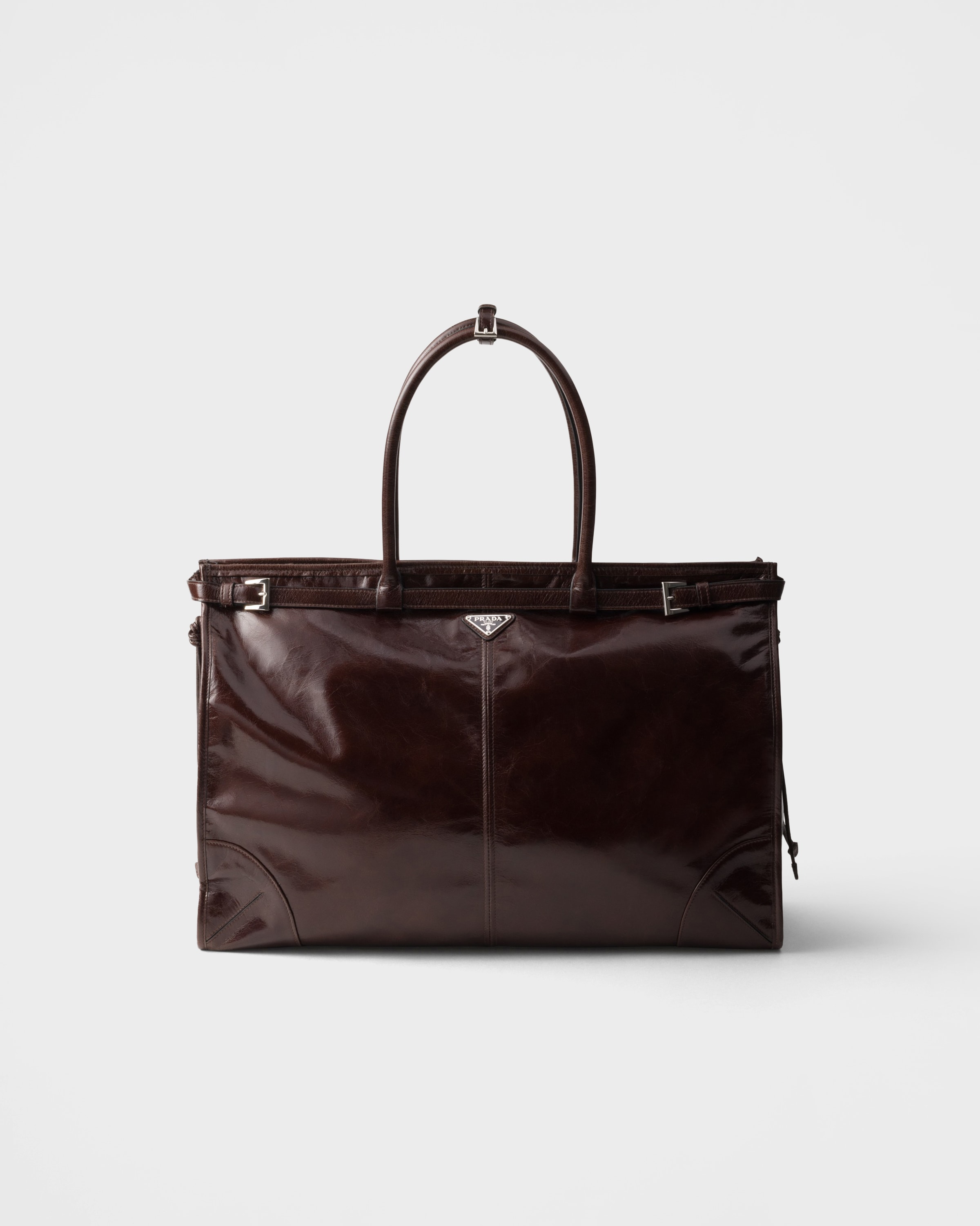 

Сумка-тоут Prada Bonnie из кожи Prada, темно-коричневый