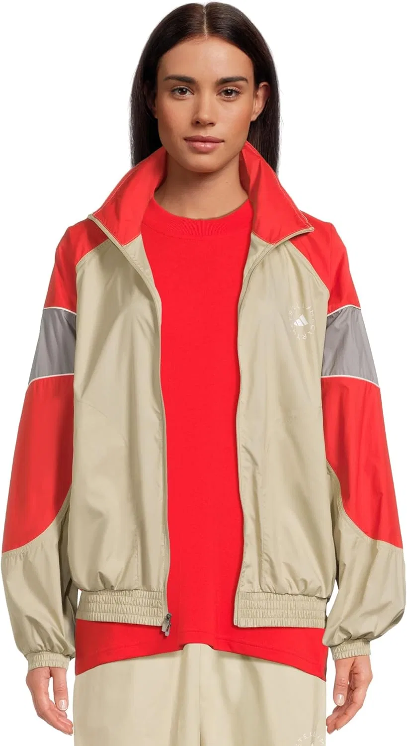 Трек-куртка женская WIND.RDY adidas, цвет Desert Sand-smc Active Red