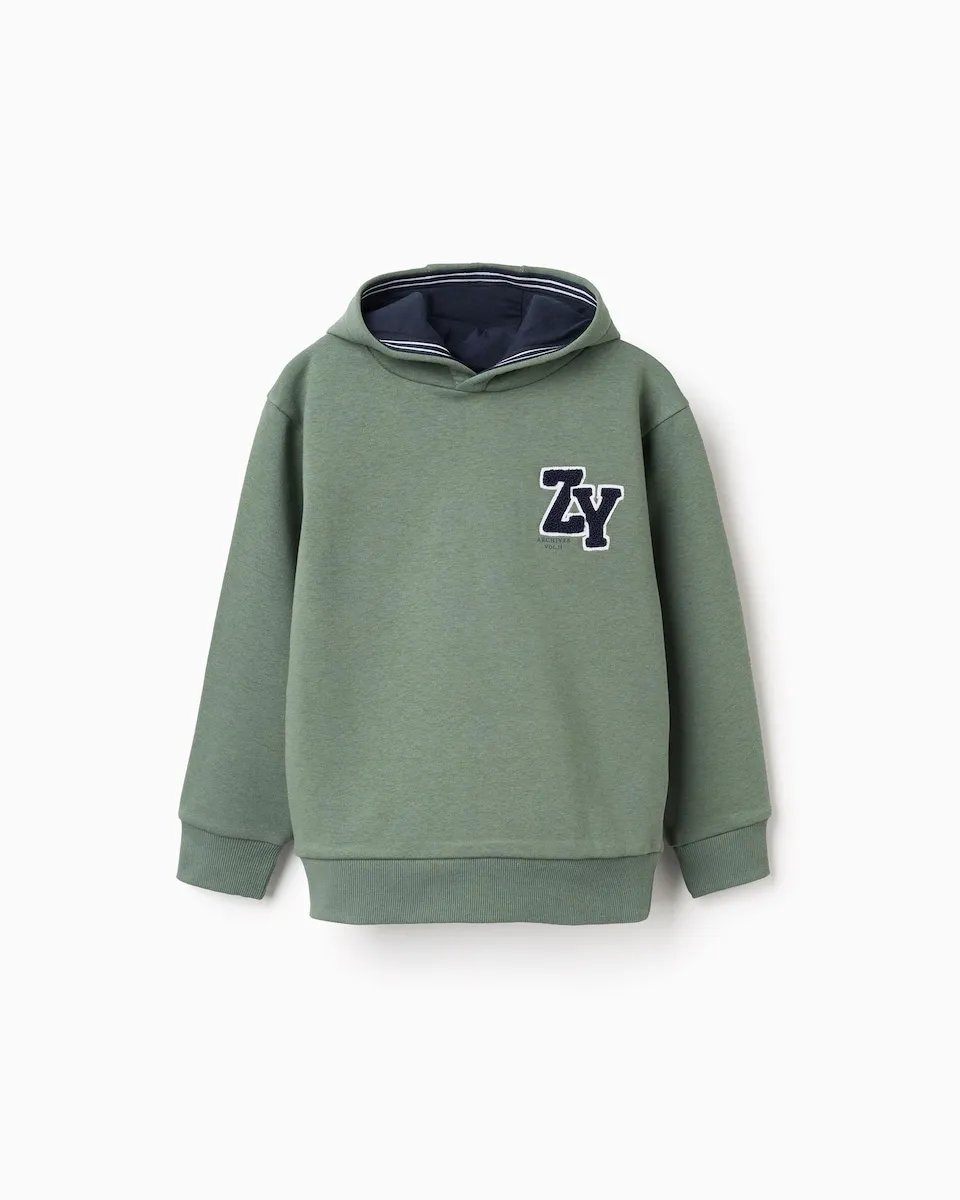 

Детская толстовка с капюшоном, подвешенная на вешалке Zippy, зеленый