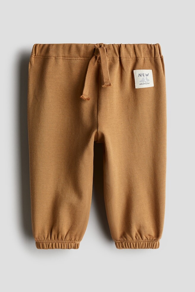

Хлопковые спортивные брюки H&M, коричневый