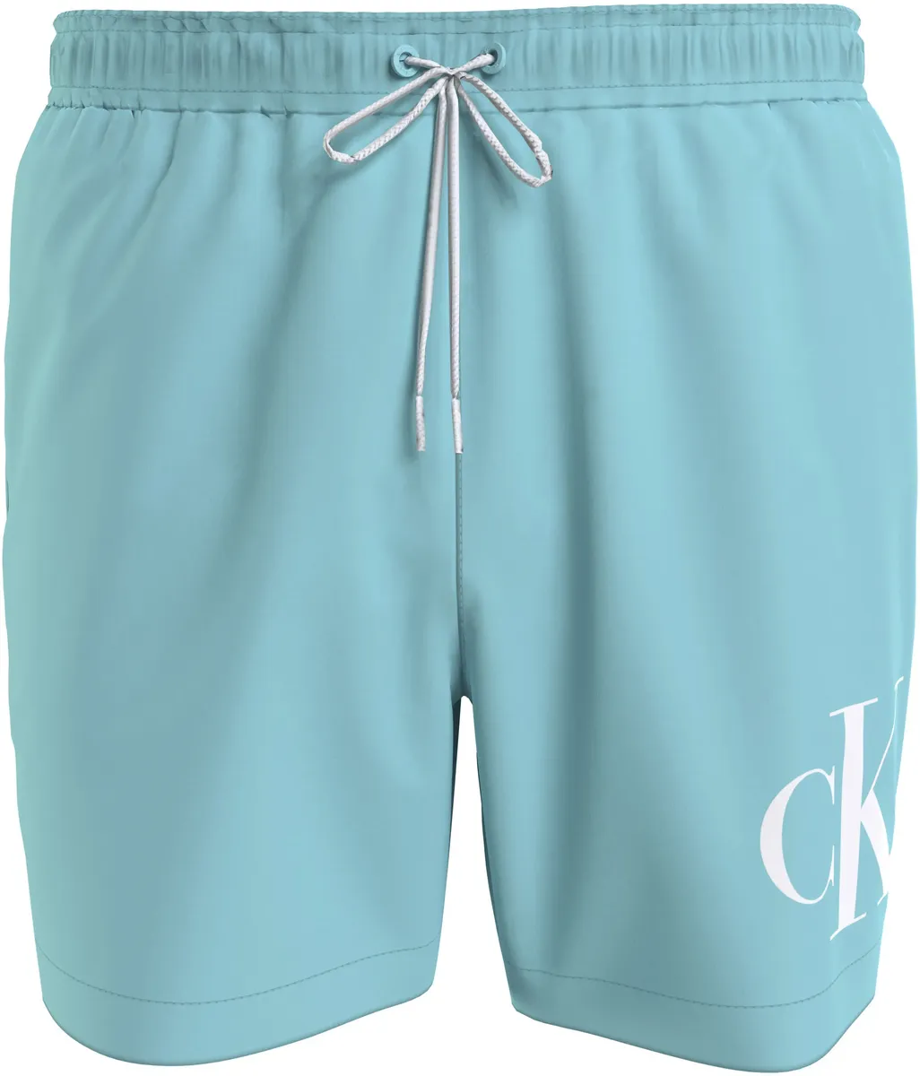 

Купальные шорты Calvin Klein Swimwear "СРЕДНЯЯ КУЛИСКА", с контрастным логотипом, цвет Soft Turquoise