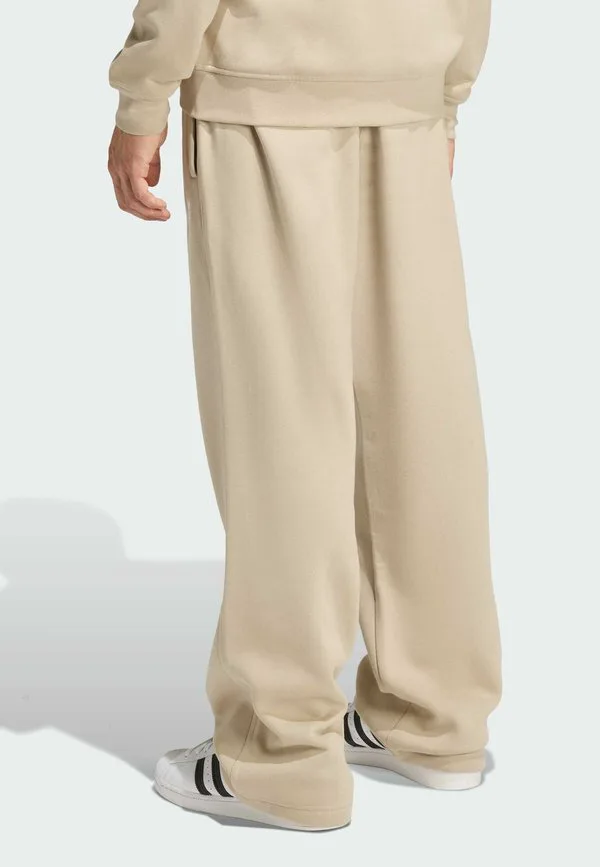 Свободные спортивные штаны унисекс Adidas Originals, Stone Khaki — фото 2