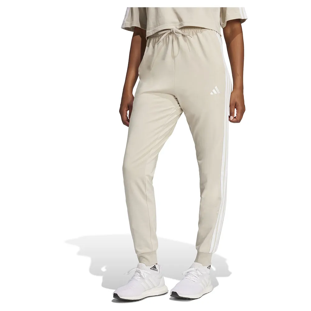 

Джоггеры adidas Essentials 3 Stripes, бежевый