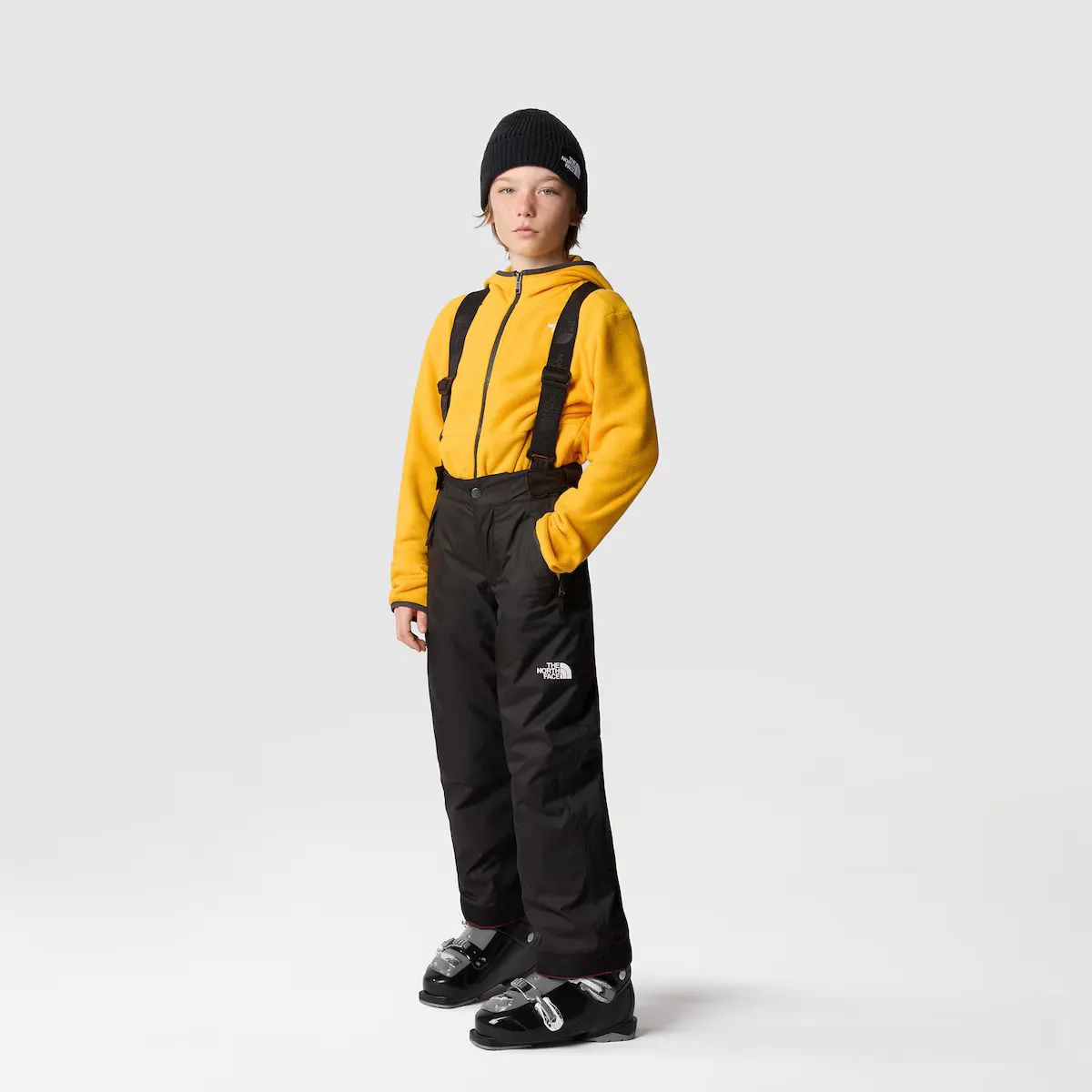 

Детские зимние штаны The North Face SNOWQUEST SUPENDER, черный