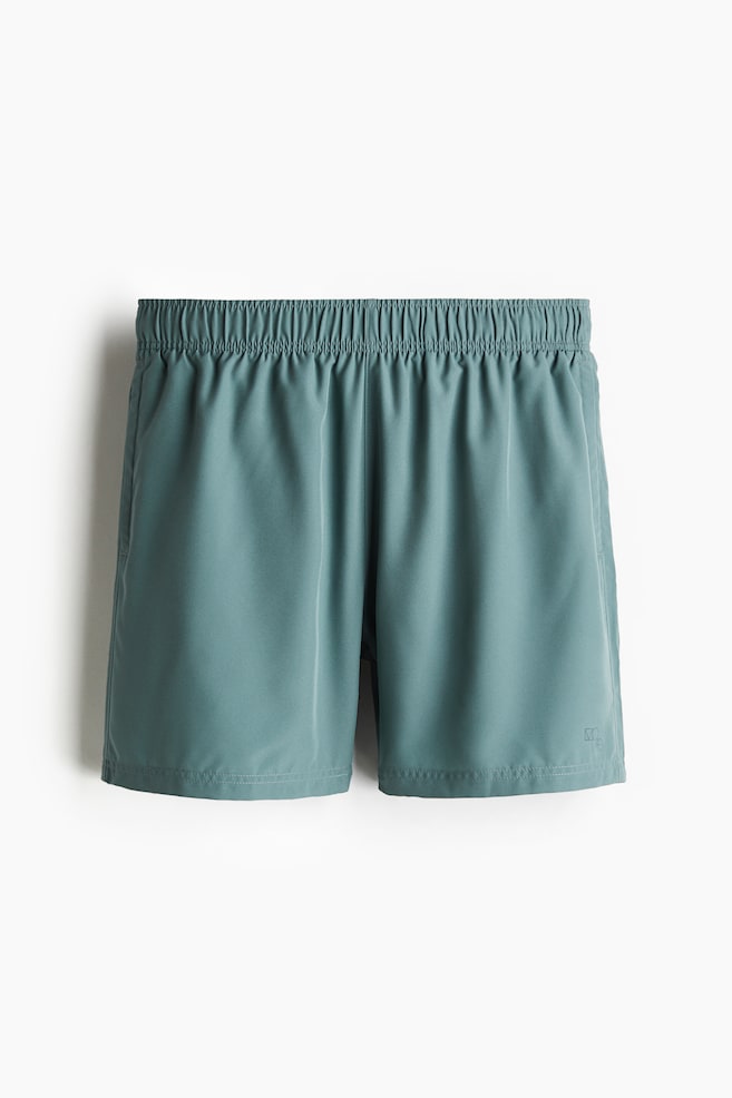 

Спортивные шорты средней длины с драймоувингом H&M, бирюзовый