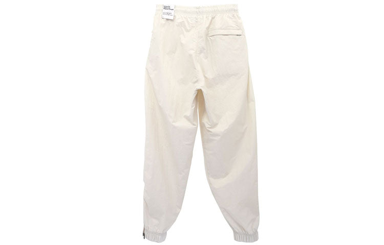Спортивные брюки Men's Nike Solid Color Logo Printing Elastic Waistband Bundle Feet Sports Pants/Trousers/Joggers Autumn White DQ6572-030 — фото 2