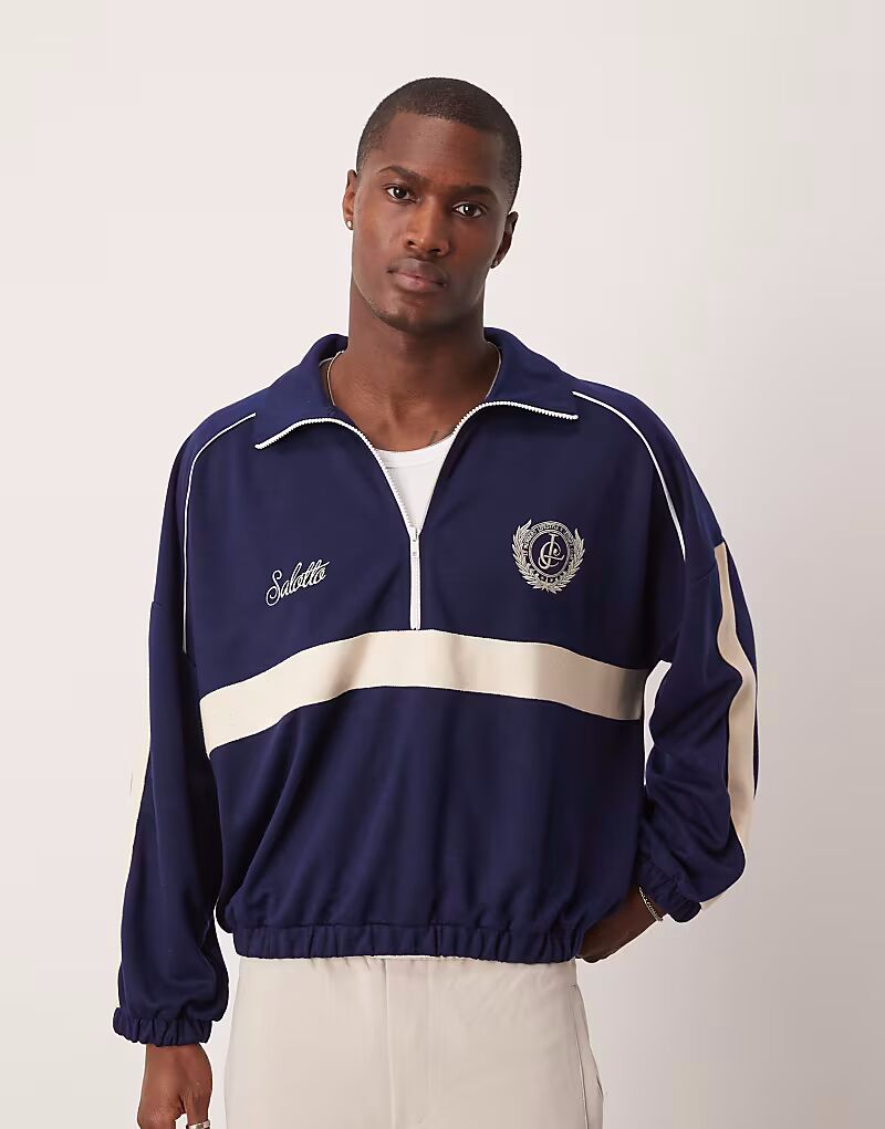 

Свободный джемпер свободного кроя с заниженной линией плеч ASOS DESIGN, молния на половину длины, с принтом на груди, темно-синего цвета