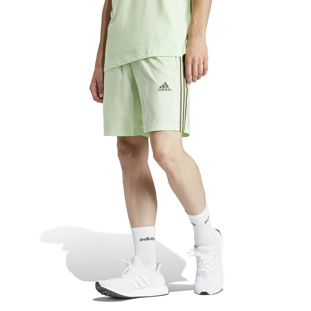 

Мужские шорты «Челси» adidas AEROREADY Essentials 9 дюймов с 3 полосками Adidas, цвет Semi Green Spark