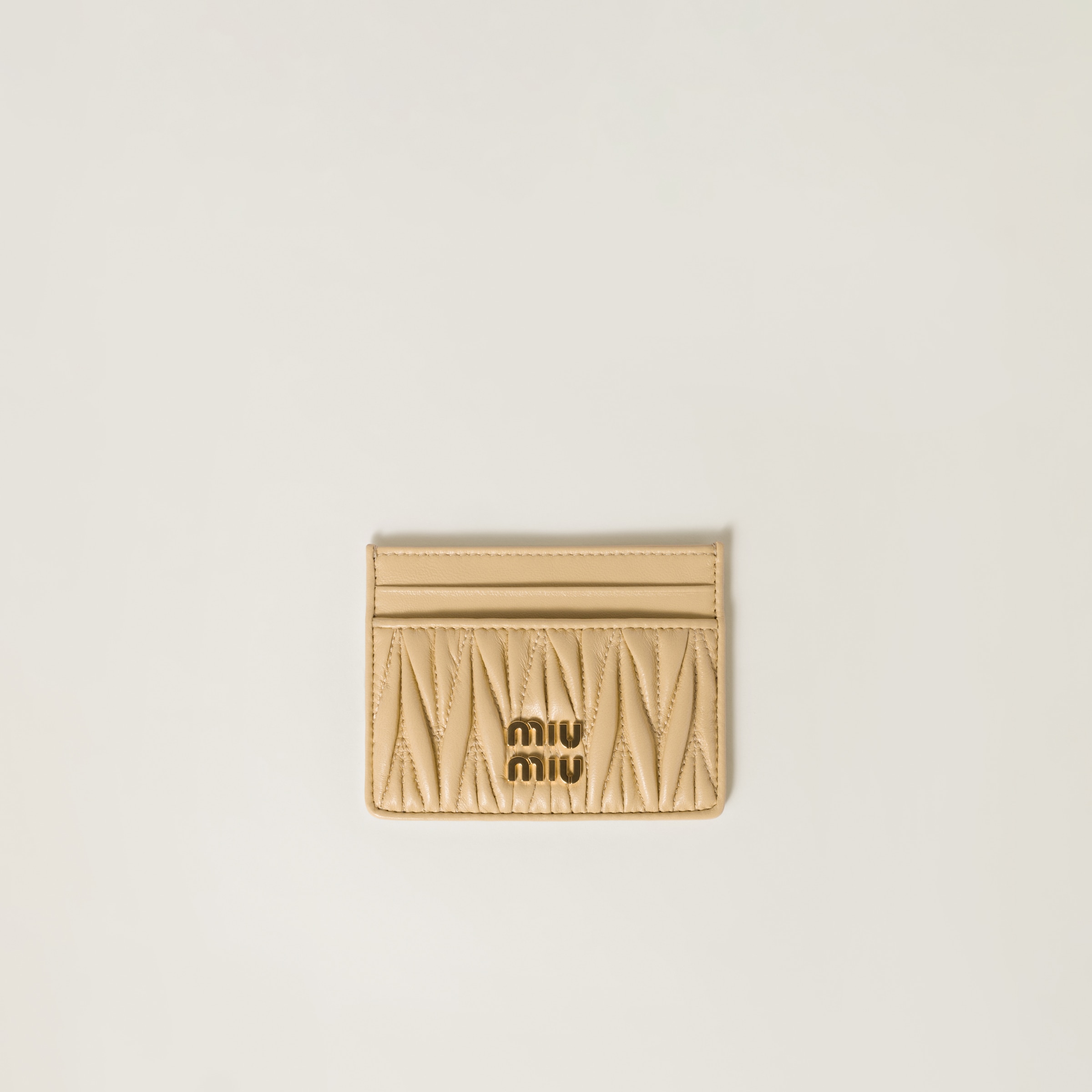 

Кардхолдер из наппы с простежкой мателассе MIU MIU, светло-зеленый