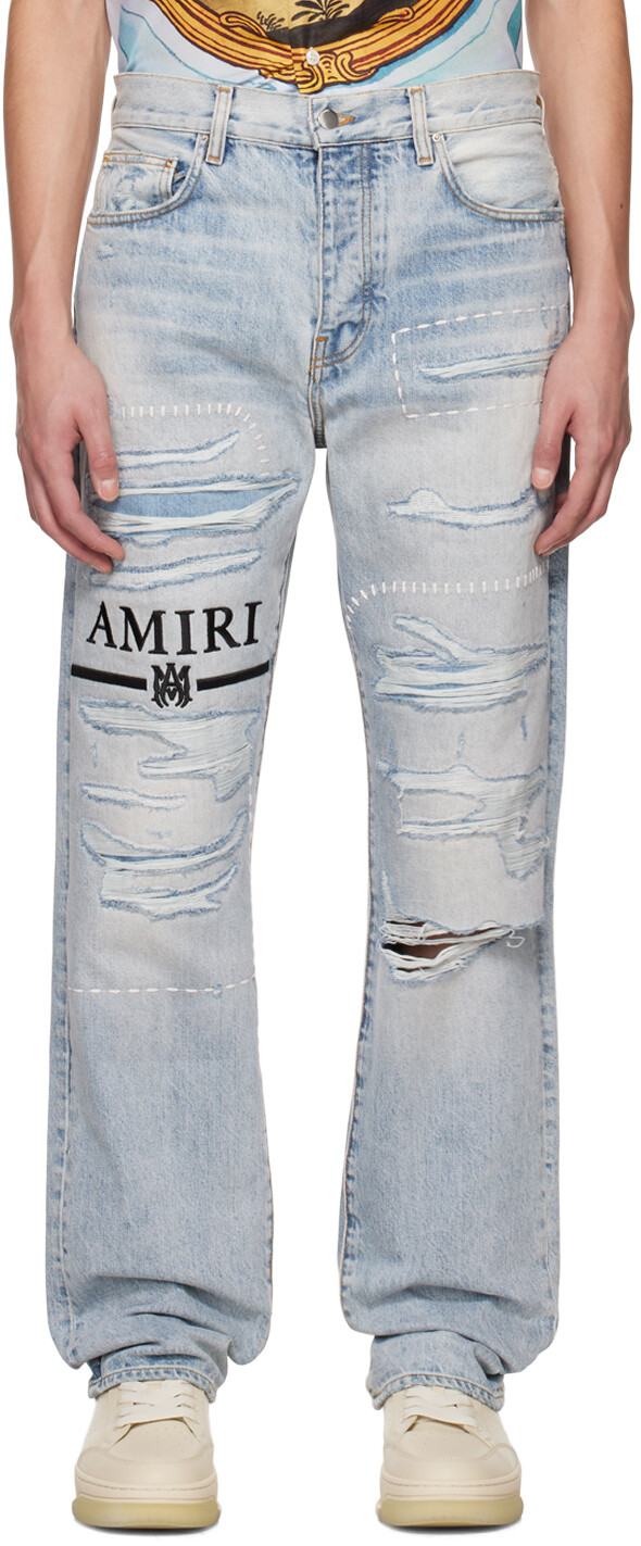 

Синие рваные джинсы AMIRI