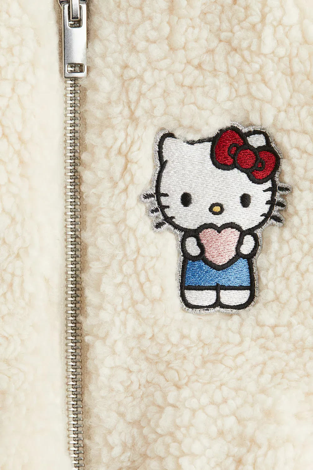 Пилотская куртка из плюшевого флиса с аппликациями H&M, Cremefarben/Hello Kitty — фото 3