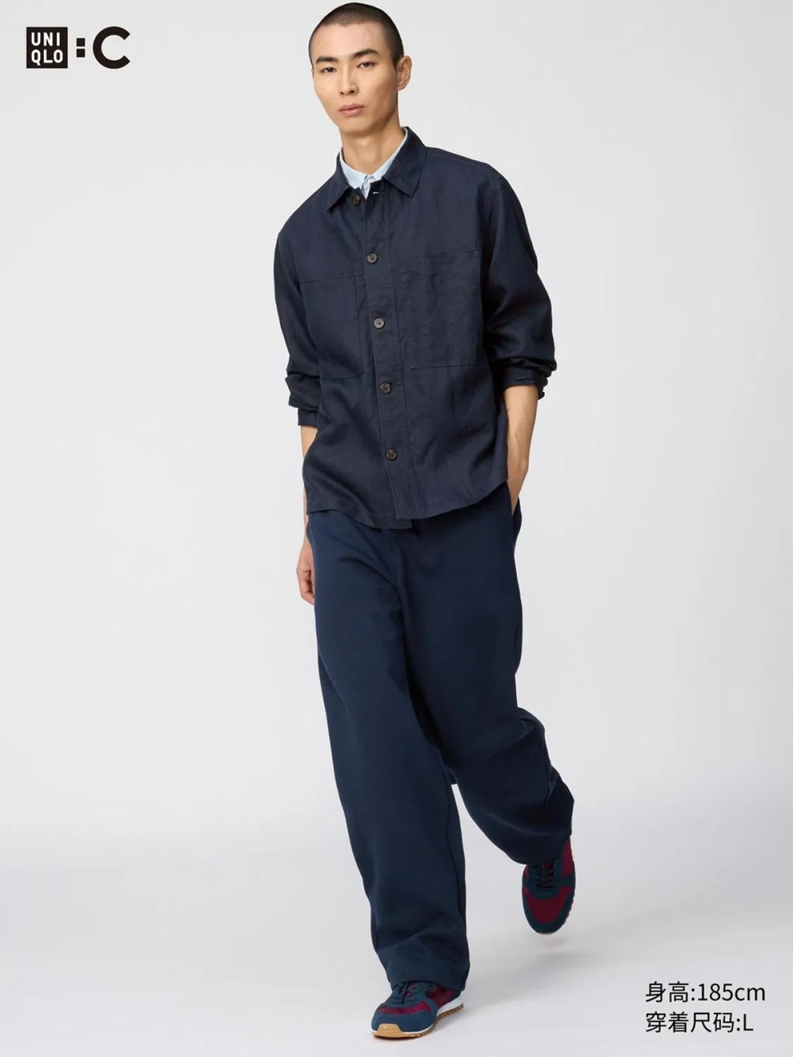 Брюки спортивные свободные с кулиской на штанине удлиненные Uniqlo, темно-синий
