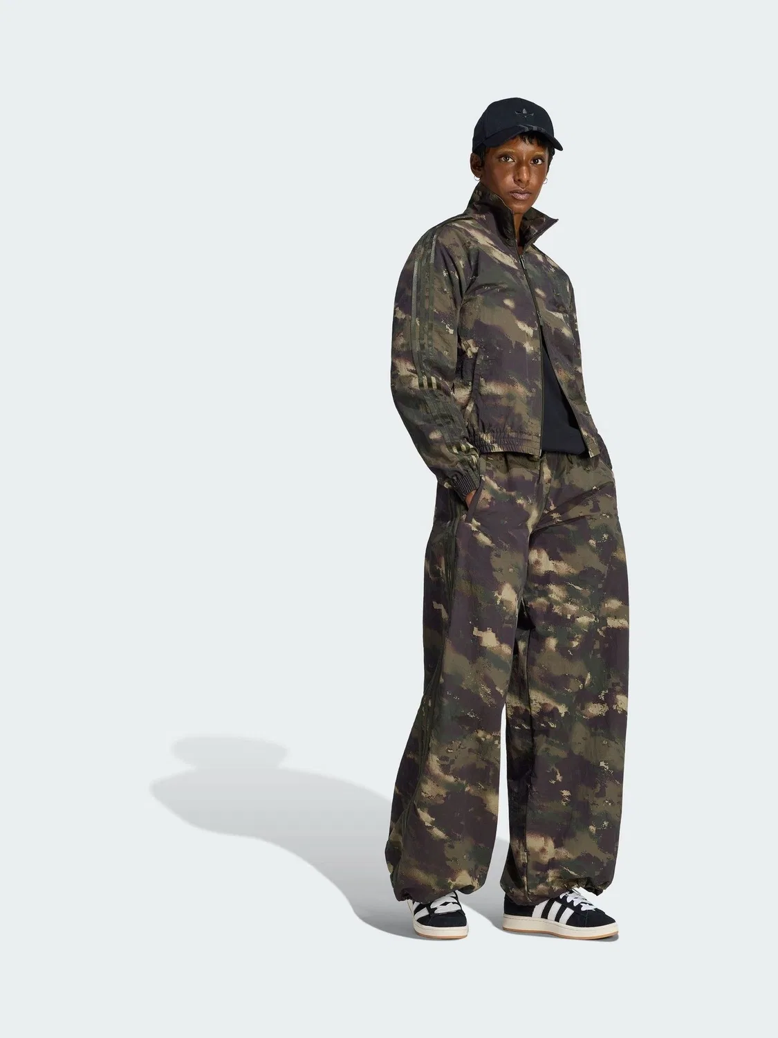 Зеленые спортивные брюки с камуфляжным принтом adidas Originals Adilenium