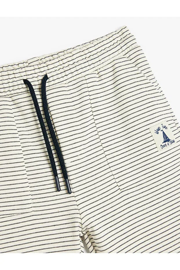 Детские шорты для мальчиков хлопковые Striped cotton bermuda shorts with lace-up waist Koton, Navy Blue Striped — фото 3